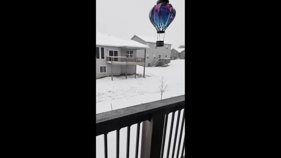 Heavy snowfall quickly builds up in Oak Grove, Missouri, USA