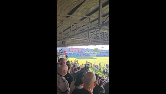Fans wave Palestinian flags in solidarity at Dalymount Park during Nakba Day match in Dublin