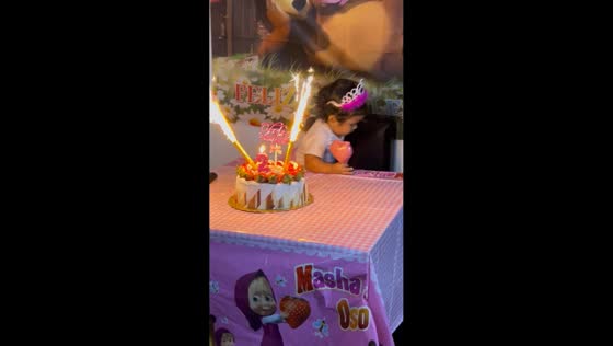 Toddler gets startled by sparkling candle during birthday in Barquisimeto, Venezuela
