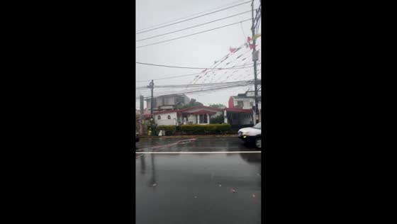 Strong winds tear down fiesta decorations in San Pedro, Laguna, Philippines