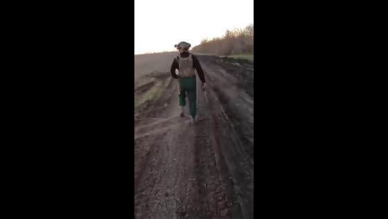 Ukrainian soldiers walk through FPV drone fiber webs in Pokrovsk, Ukraine