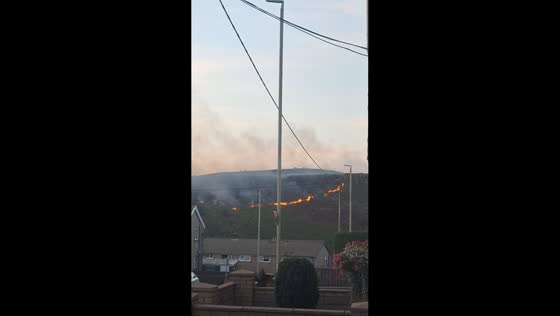 Thick smoke blankets hills as mountain fire burns near Trebanog, UK