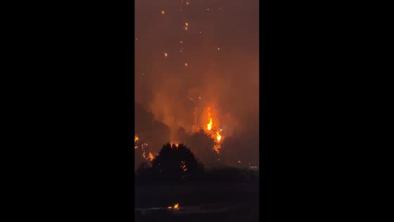 Drone sparks ignite hillside fire during Liuyang light show in Hunan, China
