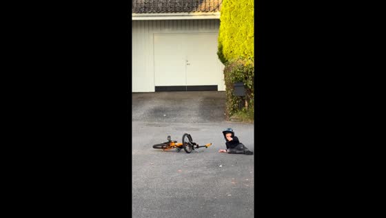 Boy gives thumbs up after funny bicycle mishap in Sweden