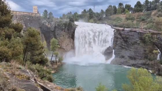 Sluice gate release creates powerful water flow at Sant Antoni Reservoir in Catalonia, Spain
