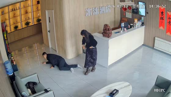 Man slips while attempting playful kick in Inner Mongolia, China
