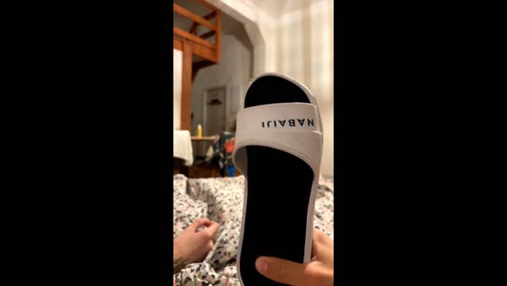 Person turns off lights with a slipper in Biarritz, France