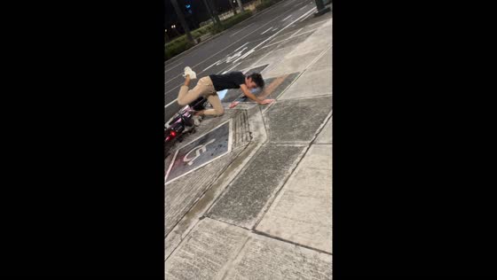 Man falls off bike in Taguig, Philippines