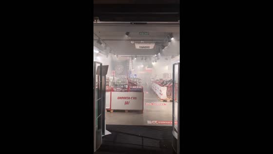 Smoke fills MediaMarkt store after vandalism during street unrest in Barcelona, Spain