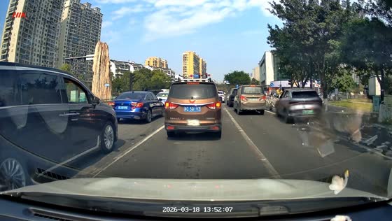 Car crashes through road railings in Zhejiang, China