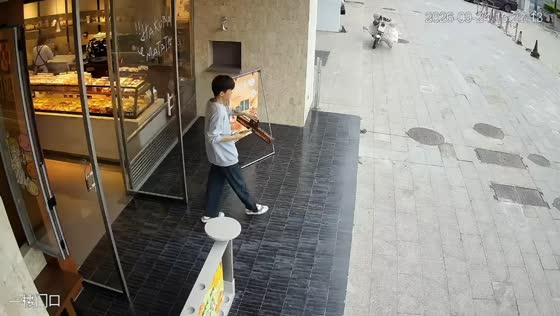 Pastry falls from its box before being accidentally run over by a motorcycle in Jiangsu, China