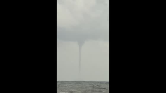 Massive waterspout forms beneath storm clouds in Goa, India