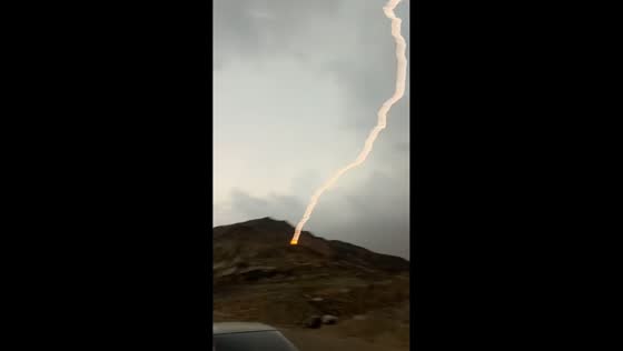 Lightning strike during slight rain in Wadi Jalil, Makkah