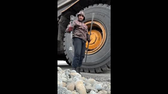 Worker injures himself while tightening a mining truck’s wheel in Sakha, Russia