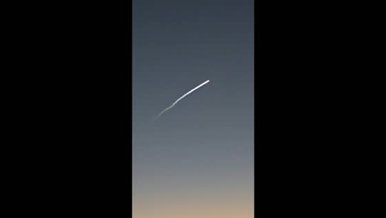 SpaceX rocket launch leaves glowing trail across the sky over Orlando, USA