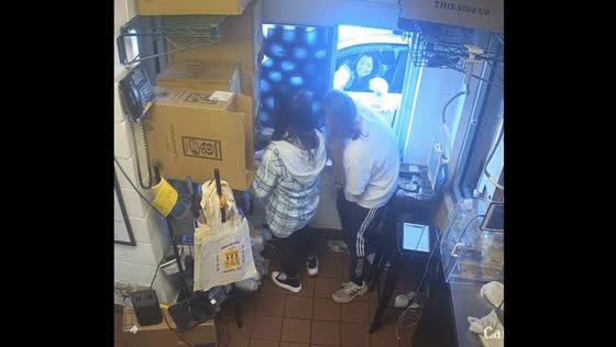 Excited dog jumps through drive-thru window at yellowhammer coffee company in Mobile, AL!