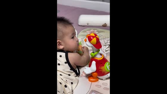 Baby pushes toy away after silly gesture in Shandong, China
