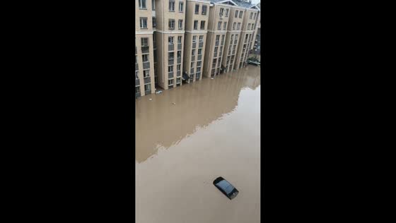 Streets and vehicles submerged after heavy rain in Hebei, China
