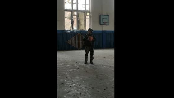 Ukrainian soldiers find joy amidst conflict: basketball break in abandoned gym near demarcation line