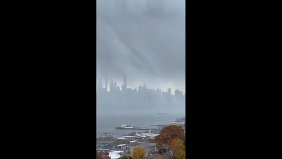 Early snowfall over New York City seen from New Jersey, USA