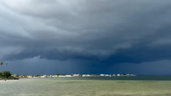 Thunderstorm shelf cloud looms over Tampa Bay in Florida, USA