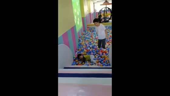 Sister secretly scares younger brother at indoor playground in Inner Mongolia, China
