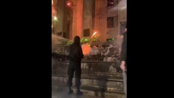 Protests in Tbilisi as people fire fireworks at parliament over EU integration delay