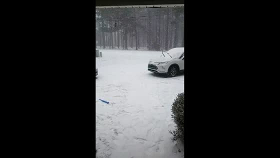 Intense snowfall piles up during major winter storm in Pinehurst, North Carolina, USA