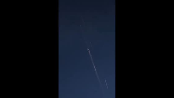 SpaceX satellite re-entry lights up the night sky in Dötlingen, Germany