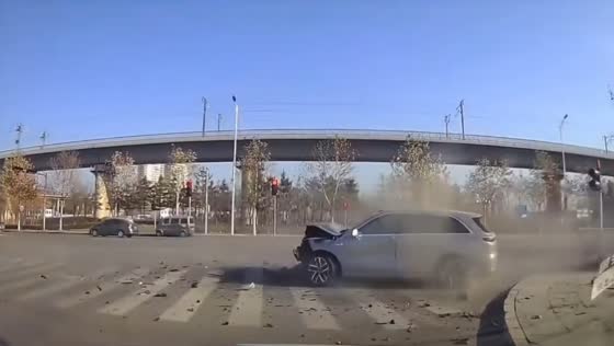 Collision between two cars at traffic lights in Guangzhou, China