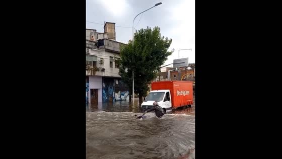 Motorcycle submerged: Buenos Aires battles waist-high floods after storm