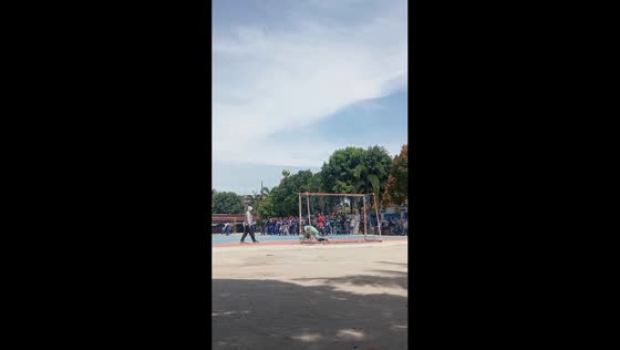 Spectator hit by a ball during football game in Belitang, South Sumatra, Indonesia