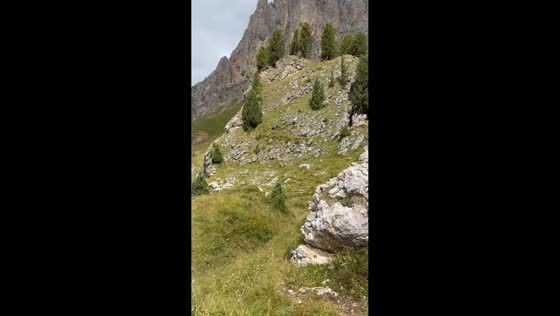 Hiker has close call on steep mountain slope in Canazei, Italy