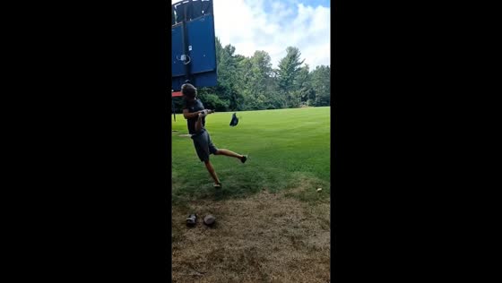 Golfer loses balance after powerful swing in Muskegon, Michigan, USA