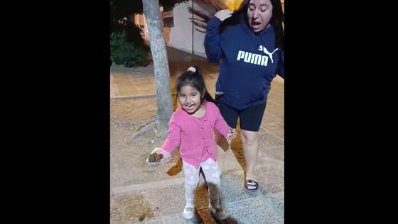 Child's reaction to collecting dog poop in Argentina