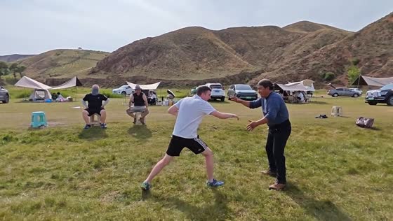 Man wins quick wrestling exchange in open field in Inner Mongolia, China