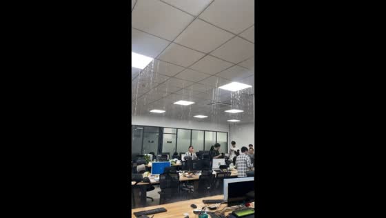 Heavy ceiling leak floods office workspace in Guangdong, China