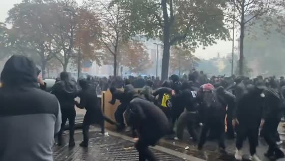 Black bloc demonstrators clash with police as cost-of-living protest turns violent in Paris, France