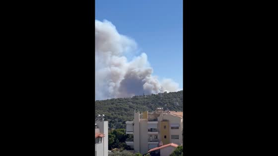 Forest fire in Rafina area seen from Athens, Greece