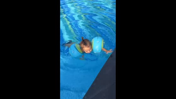 Toddler learns to swim in Urla, İzmir, Turkey