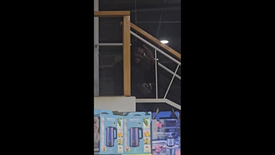 Unexpected smile surprises shopper in store in Melipilla, Chile
