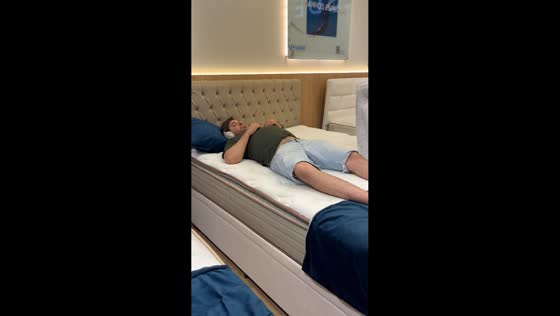Boyfriend hilariously caught sleeping on mattress in mall, São Paulo, Brazil