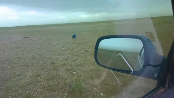 Plastic stool spins across open field in Neimenggu, China