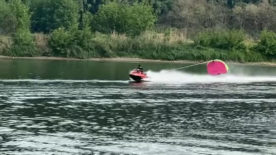 High-speed tubing sends inflatable nearly airborne in Sichuan, China
