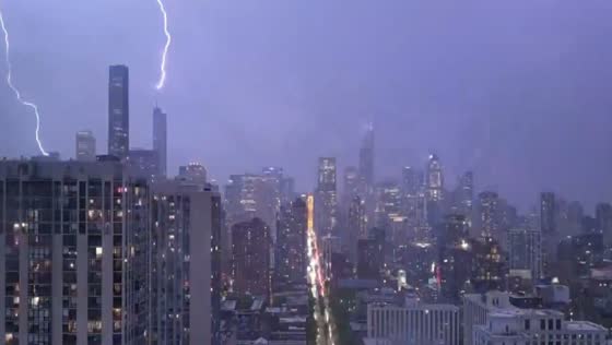 Continuous lightning illuminates skyline in Chicago, USA