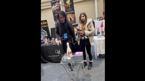 Taiwanese magician James Wang performs self-opening champagne trick at Blackpool Magic Convention