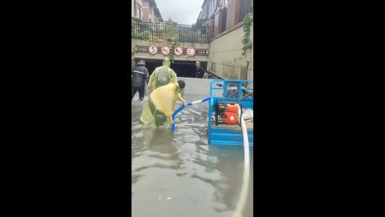Emergency crews battle severe flooding at parking garage in Jiangsu, China