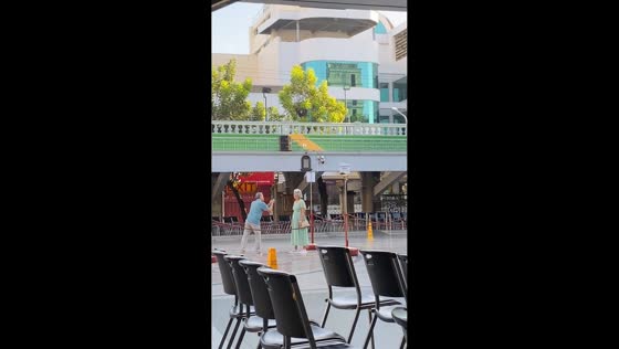 Couple sweetly entertains child during photo moment in Cebu, Philippines