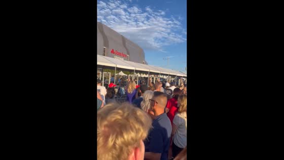 People gather at State Farm Stadium for Charlie Kirk in Glendale, Arizona