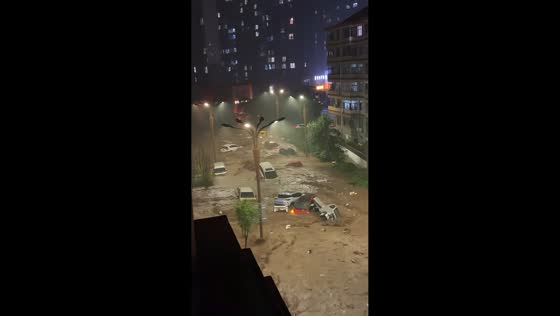 Flash floods overwhelm residential streets in Chengde, Hebei, China